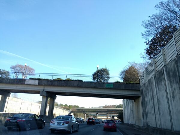 Dec. 22, 2016, Atlanta -- The Gordon C. Bynum Jr. pedestrian  bridge across Ga. 400 links the Peachtree Park neighborhood to Lenox Square. It’s at the north end of the section of the PATH400 that will link to Miami Circle upon completion next year.