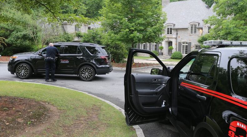 Leon Scott has been arrested and charged in connection with the armed invasion of a home on Mt. Paran Road on May 25. JOHN SPINK / JSPINK@AJC.COM
