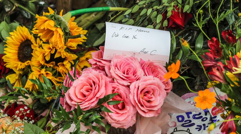 August 16, 2021: Atlanta: A mural of slain bartender Mariam Abdulrab painted by local Atlanta artists provided a back drop to a growing memorial Monday, Aug. 16, 2021 in the 700 block of Wylie Street in Atlanta. Atlanta police said Sunday they have charged DeMarcus Brinkley with murder, aggravated assault, kidnapping and other charges in the high-profile killing of a woman whose body was discovered Friday morning in southeast Atlanta. Brinkley had previously been identified as a “person of interest” in the case and is in custody at Wellstar Atlanta Medical Center, where he is being treated for injuries sustained during a chase with the Georgia State Patrol. Mariam Abdulrab, 27, a bartender at Revery VR Bar in Midtown, was returning to her home in Chosewood Park in southeast Atlanta in the early morning hours and was kidnapped outside her house at gunpoint, her friends say. A witness called 911 around 5 a.m. Friday after seeing a woman being forced into an SUV at gunpoint, according to the Atlanta Police Department. While police were still investigating the kidnapping, another 911 call came in an hour later reporting gunfire in the area of Lakewood Avenue and Terrace Way. Investigators determined the calls were related. A witness spotted Abdulrab’s body nearly four hours later, as police were preparing to canvass the area. According to the Fulton County Medical Examiner’s Office, she had been shot multiple times. A memorial for Abulrab was growing outside Revery on Monday morning. She also sometimes worked at popular Edgewood bar Church, where manager Dillon Knight would watch Abdulrab bound through the door for her shifts, her enthusiasm effervescent and contagious. He said she was funny, quirky, disarming. ”Everyone looked forward to seeing Mariam at work, on both sides of the bar,” Knight said. “She was a hard worker with a great finesse for making people feel welcome and appreciated. She had a huge heart and would go well out of her way to help out