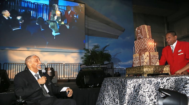 The Rev. Joseph Lowery looks on as a surprise birthday cake is rolled out at the end of his 94th birthday celebration. The party, also a fundraising event for the Joseph and Evelyn Lowery Institute for Justice and Human Rights, was held in 2015 at the Delta Flight Museum in Atlanta. Curtis Compton / ccompton@ajc.com