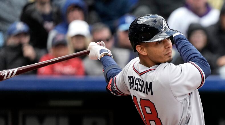 Vaughn Grissom follows through on his RBI single in the ninth inning of Sunday's 5-4 victory over the Royals. (AP Photo/Charlie Riedel)