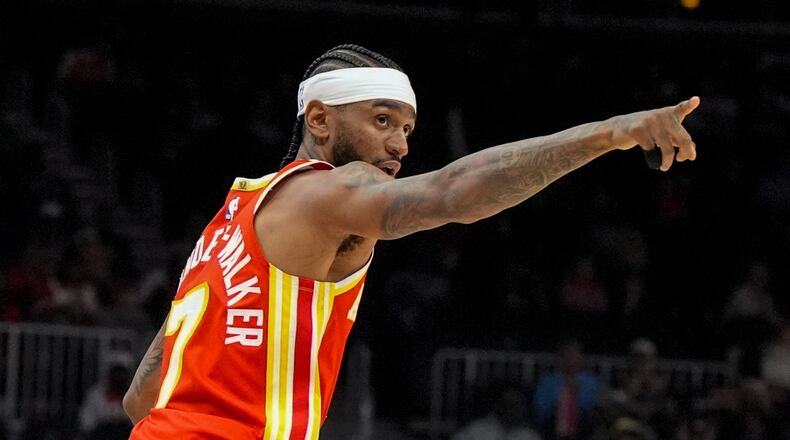 Atlanta Hawks guard Nickeil Alexander-Walker celebrates his 3-point basket against the Milwaukee Bucks during the first half of an NBA basketball game, Saturday, March 14, 2026, in Atlanta. (Mike Stewart/AP)