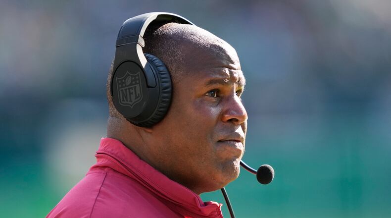 FILE - Washington Commanders offensive coordinator Eric Bieniemy watches from the sidelines during an NFL football game, Oct. 1, 2023, in Philadelphia. (AP Photo/Matt Rourke, File)