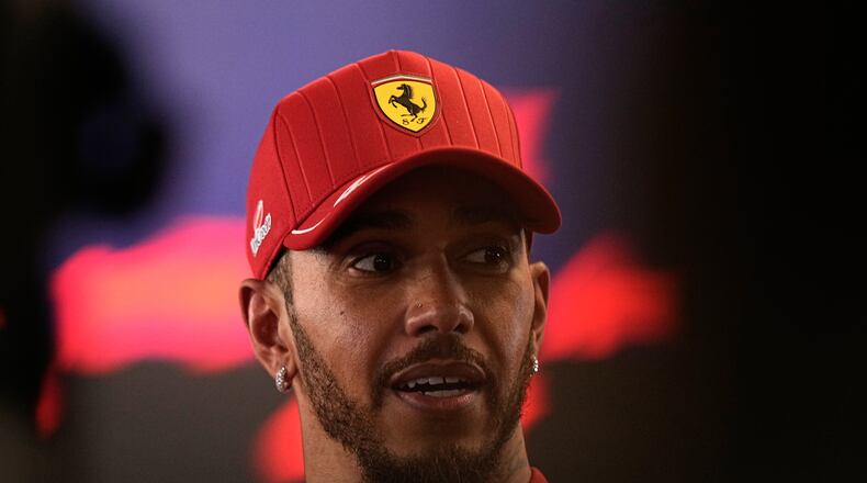 Ferrari driver Lewis Hamilton of Britain reacts after the Formula One Abu Dhabi Grand Prix at the Yas Marina Circuit in Abu Dhabi, UAE, Sunday, Dec. 7, 2025. (AP Photo/Fatima Shbair)