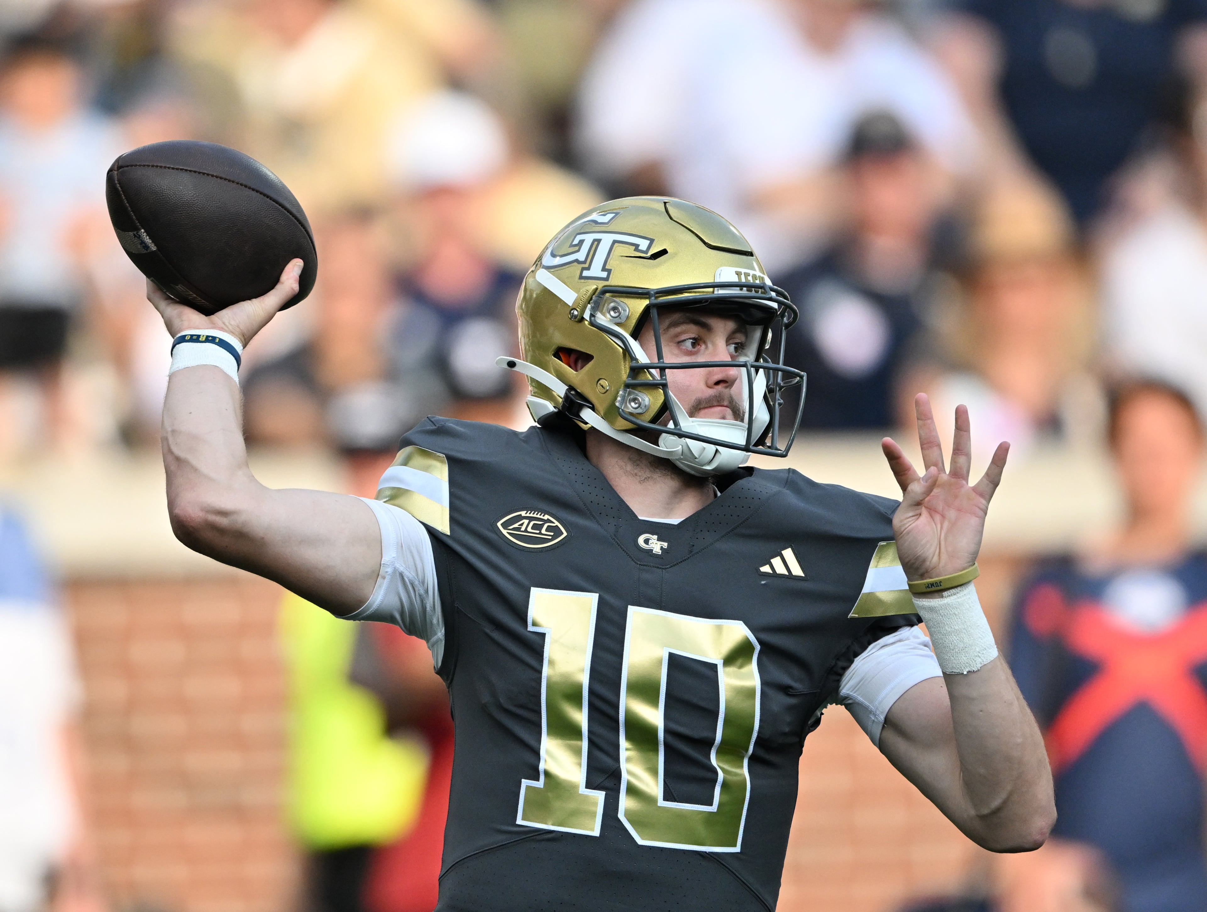 Georgia Tech quarterback Haynes King gets off a pass during the first half of an NCAA college football game at Georgia Tech's Bobby Dodd Stadium, Saturday, Sept. 20, 2025 in Atlanta. (Hyosub Shin/AJC)