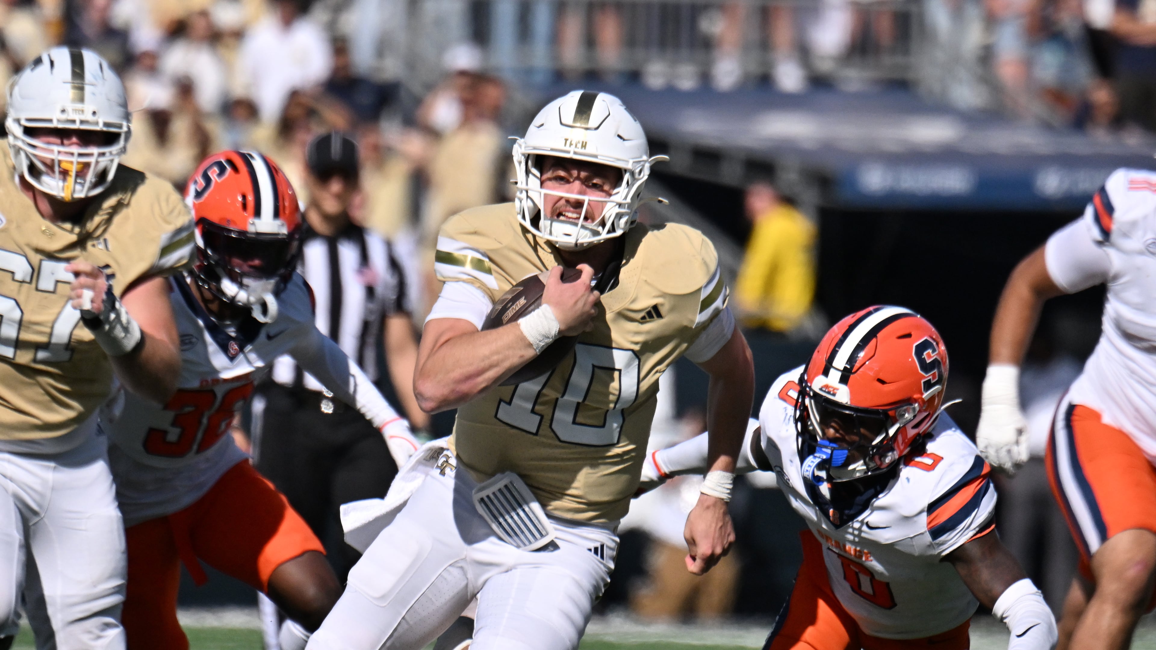 Georgia Tech quarterback Haynes King runs the ball against Syracuse at Bobby Dodd Stadium on Saturday, Oct. 25, 2025 in Atlanta. Tech last played in the ACC championship game in 2014, losing 37-35 to Florida State. (Hyosub Shin/AJC)