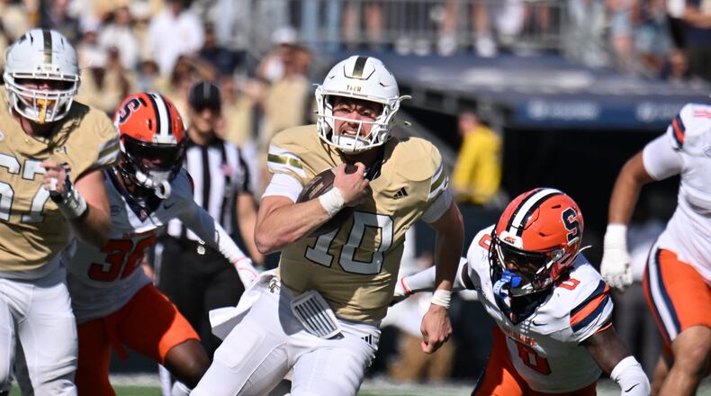 Georgia Tech quarterback Haynes King runs the ball against Syracuse at Bobby Dodd Stadium on Saturday, Oct. 25, 2025 in Atlanta. Tech last played in the ACC championship game in 2014, losing 37-35 to Florida State. (Hyosub Shin/AJC)