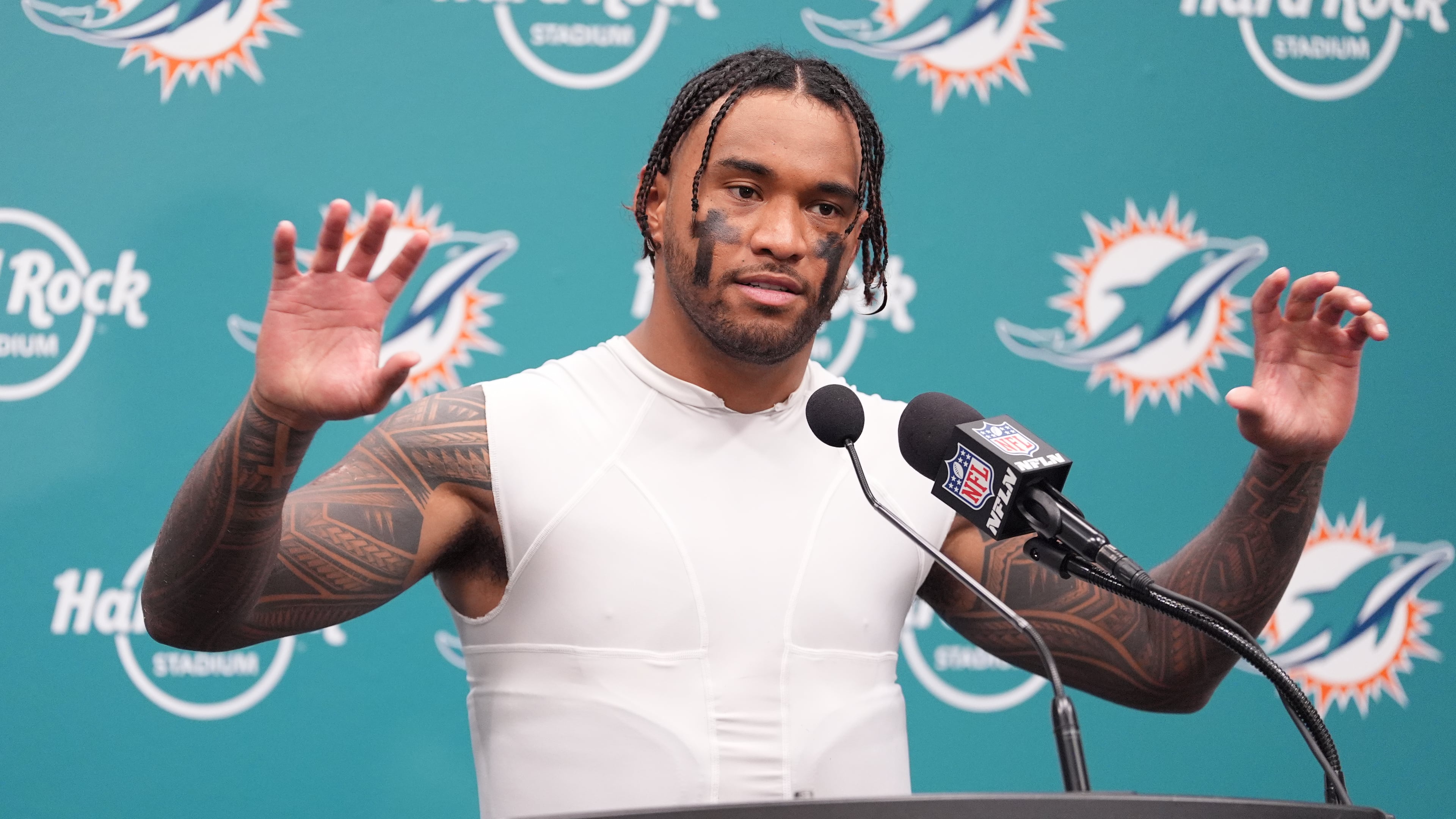 Miami Dolphins quarterback Tua Tagovailoa speaks at a news conference after the Los Angeles Chargers defeated the Dolphins 29-27 in an NFL football game Sunday, Oct. 12, 2025, in Miami Gardens, Fla. (AP Photo/Rebecca Blackwell)