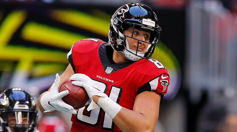 Falcons tight end Austin Hooper pulls in a reception against the Baltimore Ravens Dec. 2, 2018, at Mercedes-Benz Stadium in Atlanta.