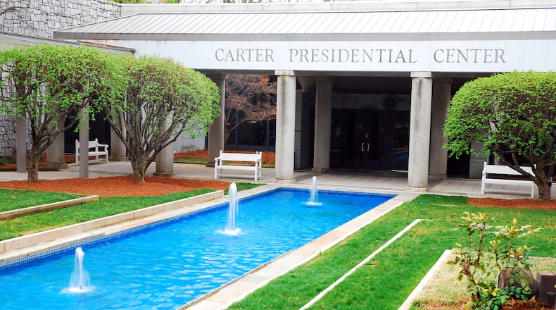 A reflective pool in front of the Jimmy Carter Presidential Library and Museum in Atlanta. A number of events are planned to mark the former president's 100th birthday later this year. Some of the events are scheduled in Carter's hometown of Plains and in Atlanta, including at the presidential library. (James Kirkikis/Dreamstime/TNS)