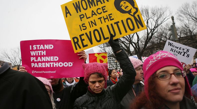 Protesters march during the Women's March on Washington on January 21, 2017 in Washington, DC. Large crowds are attending the anti-Trump rally a day after U.S. President Donald Trump was sworn in as the 45th U.S. president.