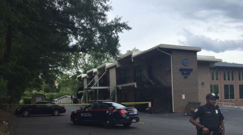 Atlanta police patrol the area where an officer was shot Saturday, June 4, 2016. (Credit: Twitter/TyishaWSB)