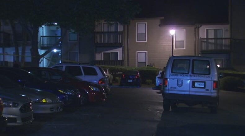 A woman was shot to death at an apartment complex in the 2000 block of Woodcrest Walk in DeKalb County. (Credit: Channel 2 Action News)