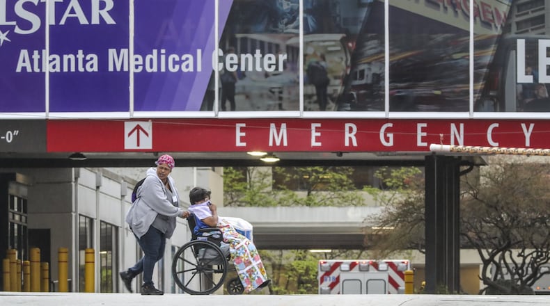 The Emergency Room Entrance at Wellstar Atlanta Medical Center on Boulevard in Atlanta. Hospitals are stocking up on gowns and protective wear and holding refresher courses in infection control amid a growing coronavirus outbreak. JOHN SPINK/JSPINK@AJC.COM
