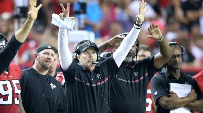 Dan Quinn's Falcons are No. 1, according to Football Outsiders. (Curtis Compton/ccompton@ajc.com)