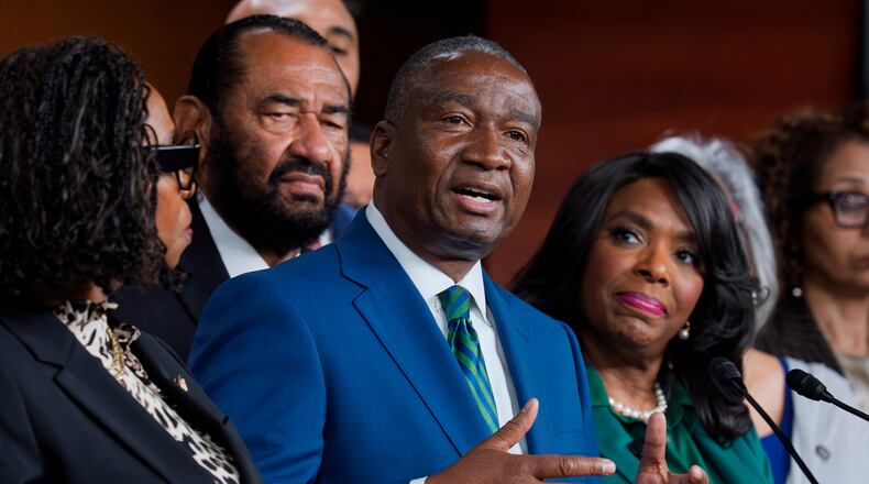 Rep. Cleo Fields, D-La., center, who represents Louisiana's 6th congressional district, is joined by members of the Congressional Black Caucus as they speak to reporters in the wake of the Supreme Court ruling to strike down his majority Black congressional district in Louisiana, at the Capitol in Washington, Wednesday, April 29, 2026. (AP Photo/J. Scott Applewhite)