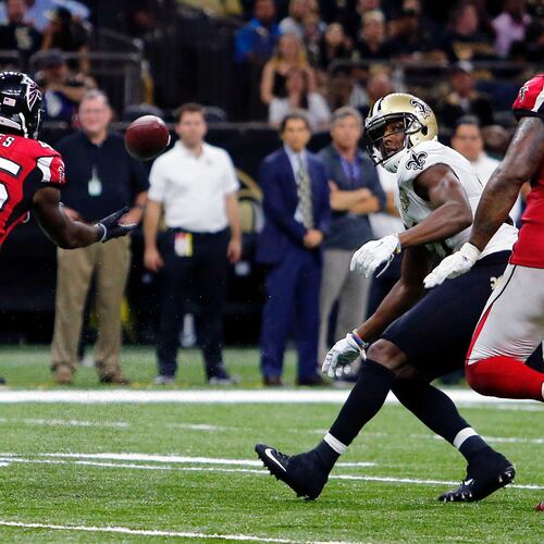 FILE - Atlanta Falcons outside linebacker Deion Jones (45) intercepts a pass from New Orleans Saints quarterback Drew Brees, not pictured, and returns it for a touchdown, in the second half of an NFL football game in New Orleans, on Sept. 26, 2016. (AP Photo/Butch Dill, File)
