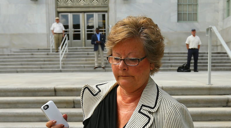 Former DeKalb County Commissioner Elaine Boyer leaves federal court Sept. 3 after her arraignment hearing for bilking taxpayers out of thousands of dollars through a kickback scheme. CURTIS COMPTON / CCOMPTON@AJC.COM