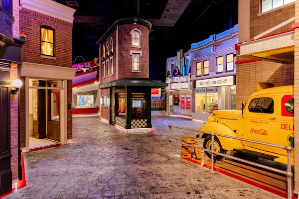 The second half of "Coca-Cola Stories" is a mock city with multiple interactive experiences that utilize artificial intelligence. On the corner of the mock city is Jacob's Pharmacy. Courtesy of World of Coca-Cola