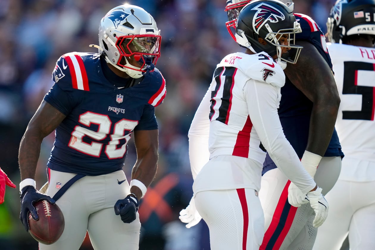 New England Patriots running back Terrell Jennings (26) celebrates a run against the Atlanta Falcons during the first half of an NFL football game, Sunday, Nov. 2, 2025, in Foxborough, Mass. (AP Photo/Charles Krupa)