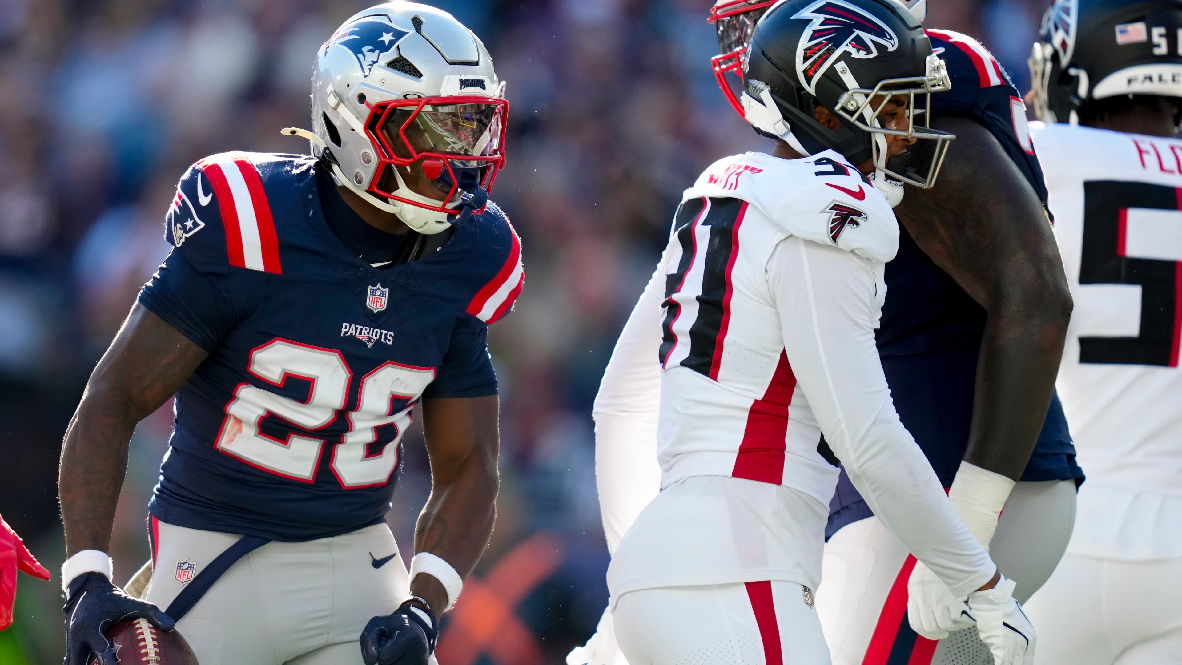 New England Patriots running back Terrell Jennings (26) celebrates a run against the Atlanta Falcons during the first half of an NFL football game, Sunday, Nov. 2, 2025, in Foxborough, Mass. (AP Photo/Charles Krupa)