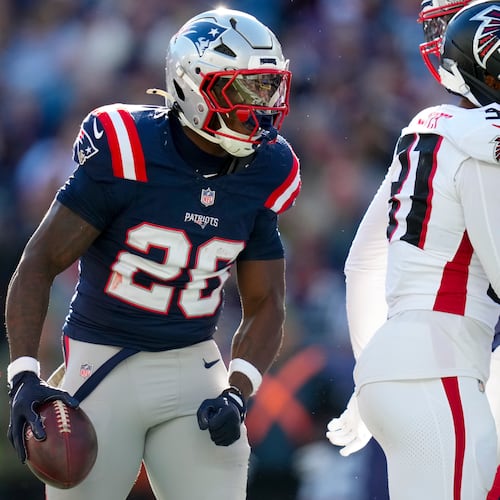 New England Patriots running back Terrell Jennings (26) celebrates a run against the Atlanta Falcons during the first half of an NFL football game, Sunday, Nov. 2, 2025, in Foxborough, Mass. (AP Photo/Charles Krupa)