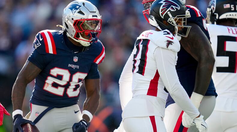 New England Patriots running back Terrell Jennings (26) celebrates a run against the Atlanta Falcons during the first half of an NFL football game, Sunday, Nov. 2, 2025, in Foxborough, Mass. (AP Photo/Charles Krupa)