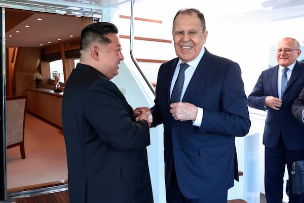 In this photo released by Russian Foreign Ministry Press Service, Russian Foreign Minister Sergey Lavrov, right, and North Korea's leader Kim Jong Un shake hands during their meeting in Wonsan, North Korea, on Saturday, July 12, 2025. (Russian Foreign Ministry Press Service via AP)