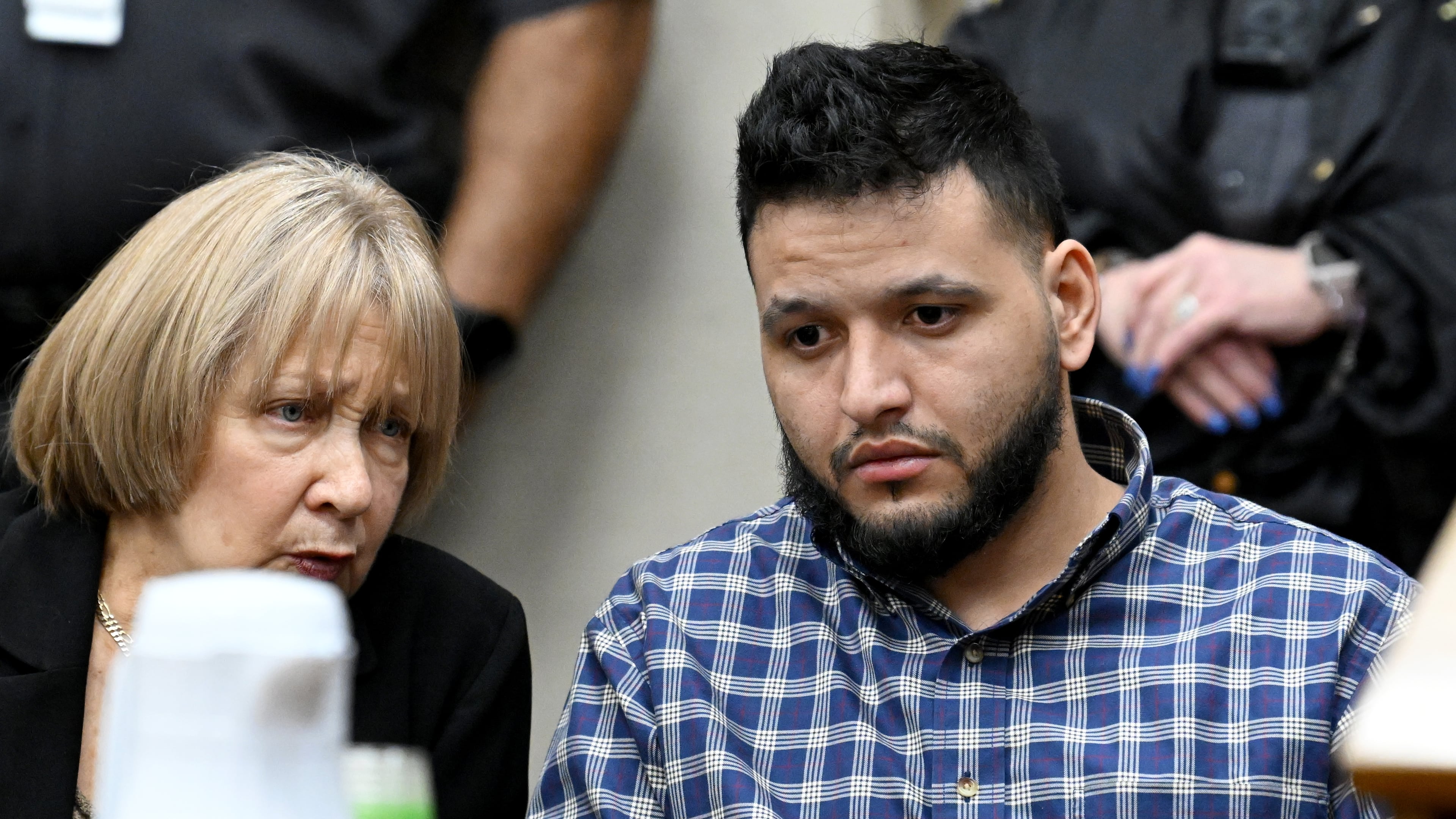 Jose Ibarra (right) listens through an interpreter during victim impact statements at Athens-Clarke County Superior Court in Athens. Jose Ibarra was found guilty of murder in the killing of nursing student Laken Riley on the University of Georgia campus and sentenced to life in prison. (Hyosub Shin/AJC 2024)