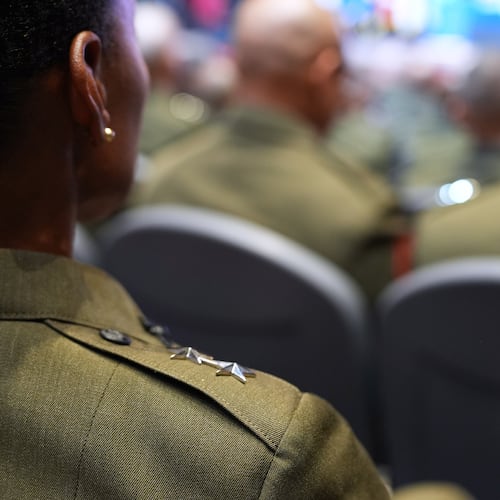 U.S. military senior leadership listen as President Donald Trump speaks at Marine Corps Base Quantico, Tuesday, Sept. 30, 2025 in Quantico, Va. (AP Photo/Evan Vucci)