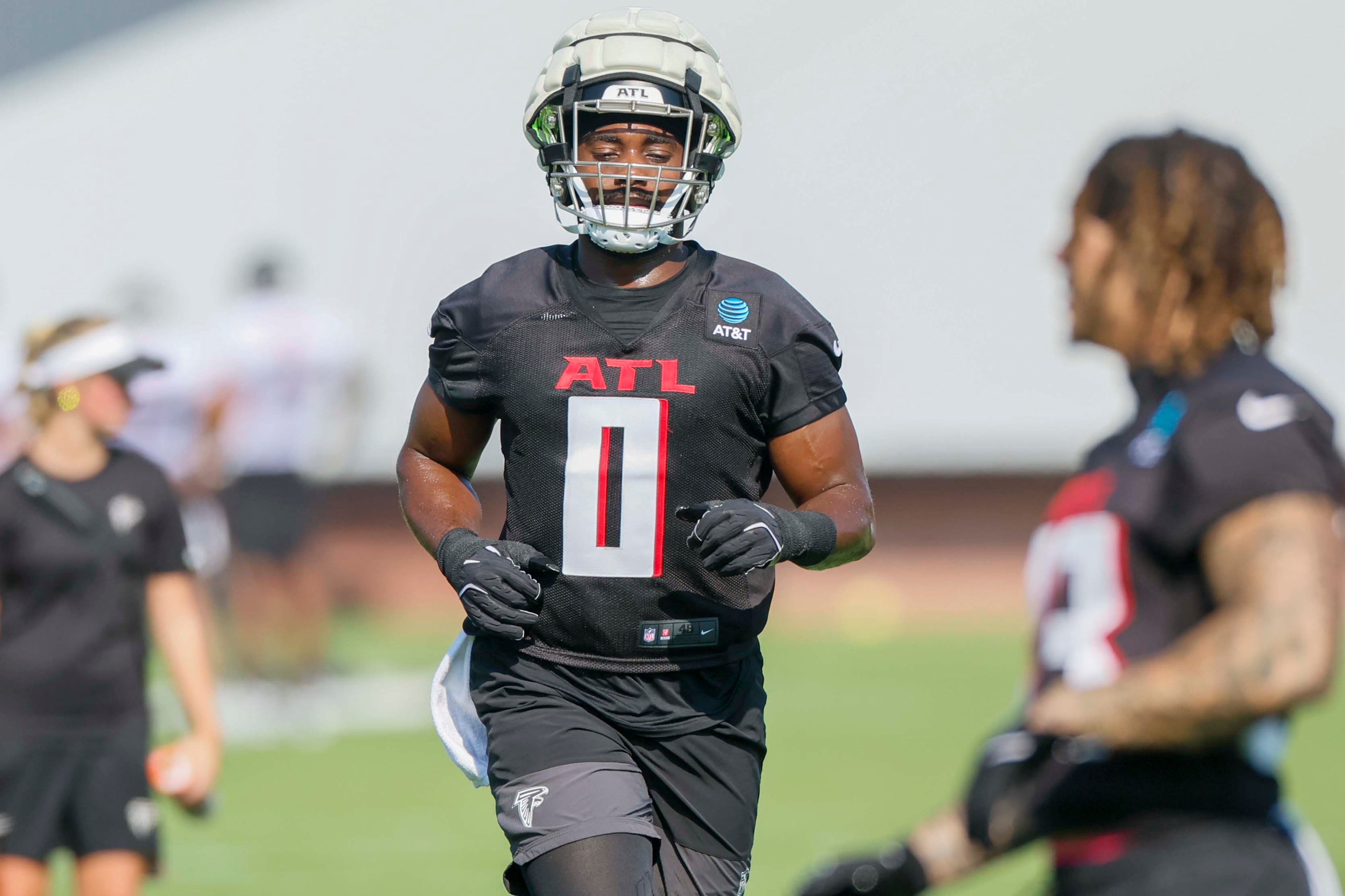 Atlanta Falcons linebacker Divine Deablo participates in a drill during the first practice of training camp on Thursday, July 24, 2025, in Flowery Branch. (Miguel Martinez/AJC)