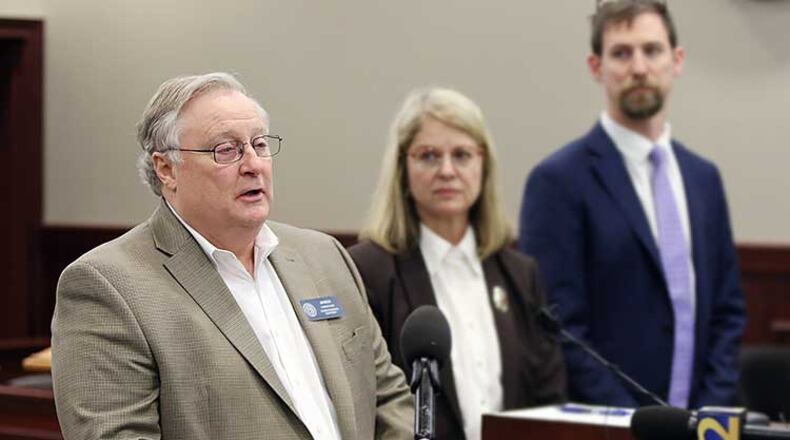 Jim Beck, the commissioner of the Georgia Insurance Department, speaks at a press conference about an insurance fraud bust. EMILY HANEY / emily.haney@ajc.com