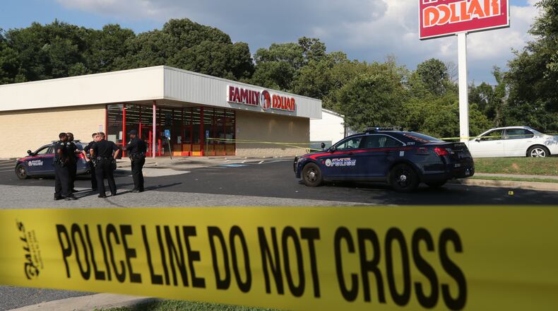 Police believe an argument escalated into a shooting Tuesday around 4:40 p.m. at a Family Dollar near the intersection of Donald Lee Hollowell Parkway and Hamilton E. Holmes Drive in Atlanta.