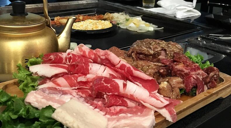 A combination for two at Miss Gogi includes brisket, pork belly, galbi and other meats. CONTRIBUTED BY WYATT WILLIAMS