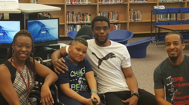 Chadwick Boseman, star of the upcoming "Black Panther" Marvel movie franchise, made a surprise visit to a Cobb County student-fan. Left to right: teacher Alisha Smith, student Ian Hopgood, Boseman and paraprofessional Kendrick Love.