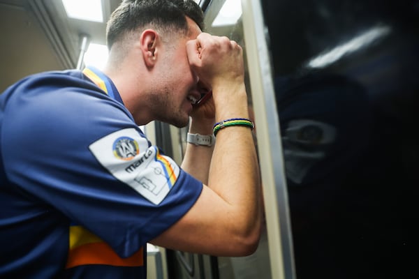Barbosa reacts to missing a train transfer during his Guinness World Record run for the fastest time visiting every MARTA station. (Abbey Cutrer/AJC)
