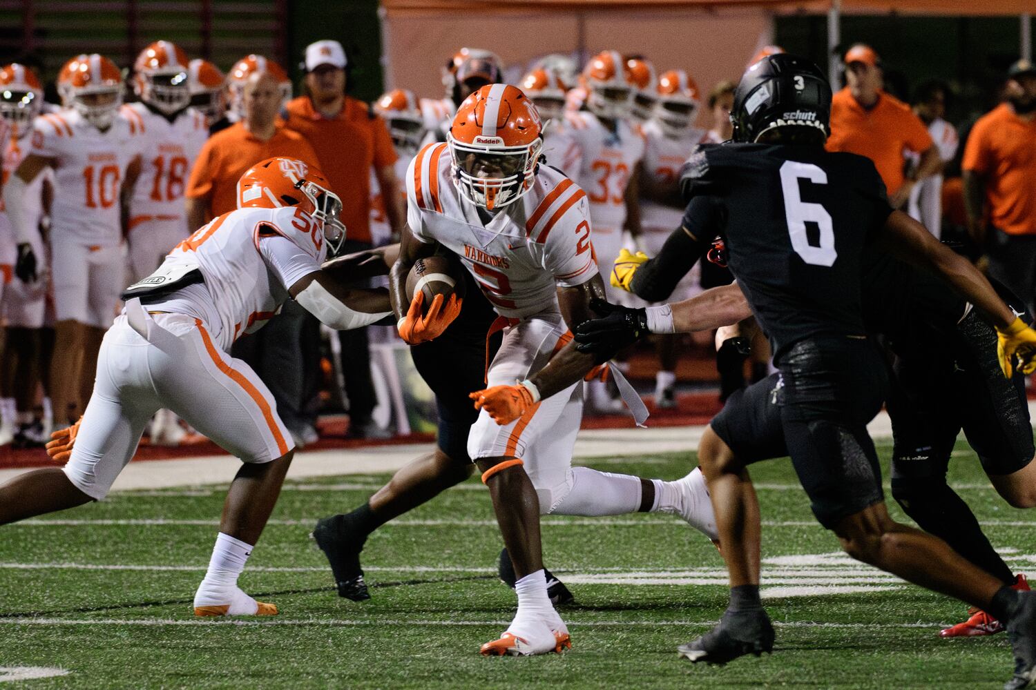 North Cobb's David Eziomume looks for yardage during Friday's game against Milton. (Jamie Spaar for the Atlanta Journal Constitution)
