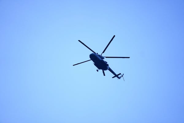 An Indian army helicopter patrols above Pahalgam a day after militants indiscriminately opened fire on tourists near the town, Indian controlled Kashmir, Wednesday, April 23, 2025. (AP Photo/Dar Yasin)