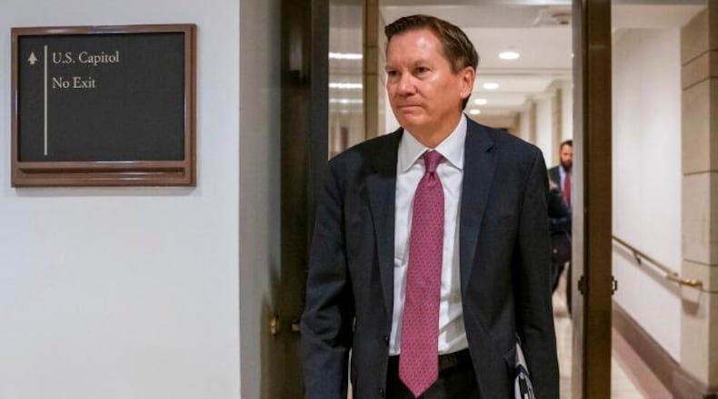 FILE - In this Oct. 4, 2019, file photo, Michael Atkinson, the inspector general of the intelligence community, arrives at the Capitol in Washington for closed-door questioning about a whistleblower complaint that triggered President Donald Trump's impeachment. Trump has fired Atkinson. Trump informed the Senate intelligence committee Friday, April 3, 2020, of his decision to fire Atkinson, according to a letter obtained by The Associated Press. (AP Photo/J. Scott Applewhite, File)