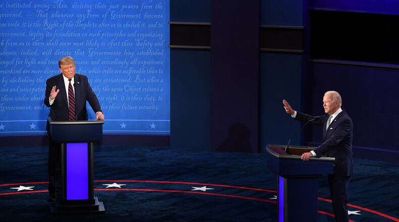 President Donald Trump, left, and Democratic presidential nominee Joe Biden during the first of three scheduled 90-minute presidential debates, in Cleveland on September 29, 2020. (Kevin Dietsch/Pool/Abaca Press/TNS)