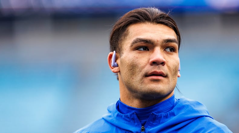 FILE - Los Angeles Rams wide receiver Puka Nacua (12) warms up before an NFL football game against the Carolina Panthers, Nov. 30, 2025, in Charlotte, N.C. (AP Photo/Rusty Jones, File)