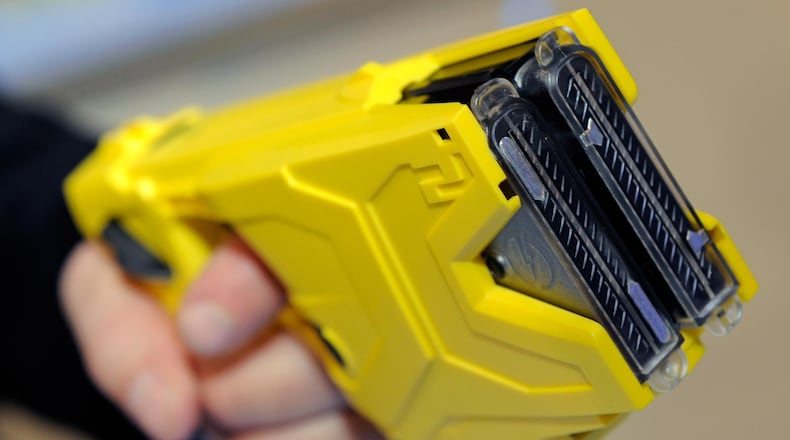 Michigan police are conducting an investigation after an officer allegedly tasered a man who was holding his baby.