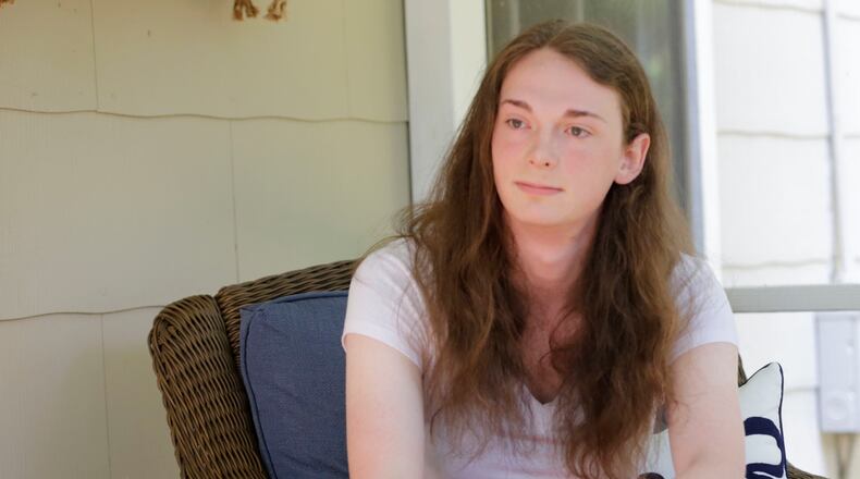 Rose is a transgender student who graduated from Druid Hills HS in May. Sitting on her back porch, she talked about the difficulty of being a transgender student in high school and the challenges ahead. BOB ANDRES / BANDRES@AJC.COM