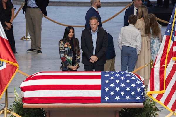 Attendees pay their respects during a funeral service for former U.S. Rep. Mia Love, Sunday, April 6, 2025, in Salt Lake City. (AP Photo/Melissa Majchrzak)