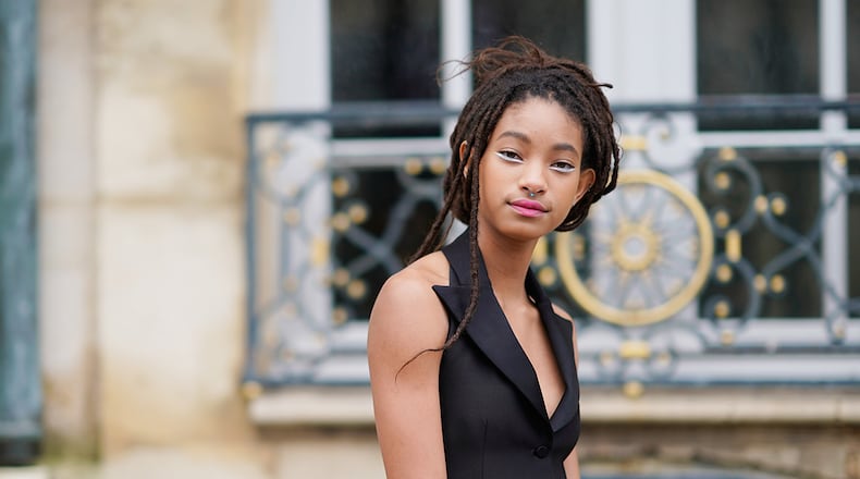 Willow Smith, daughter of Will Smith and Jada Pinkett Smith, practices polyamory. It means she’s open with partners about her other relationships but isn’t monogamous to just one. (Photo by Edward Berthelot/ for Christian Dior)