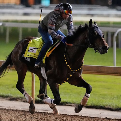 Kentucky Derby alternate Robusta works out at Churchill Downs Thursday, April 30, 2026, in Louisville, Ky. (AP Photo/Charlie Riedel)