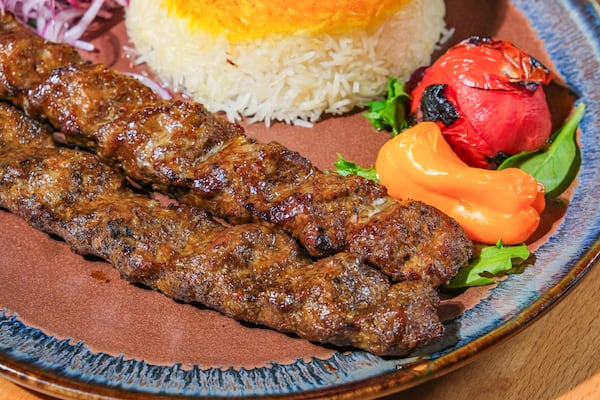 Any kebab order at Chelo in Roswell will arrive succulent and juicy, such as the lamb koobideh with its accompanying polo rice. (Courtesy of Chelo)