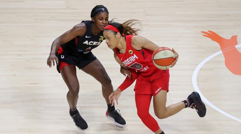 Chennedy Carter, right, scored 23 but the Dream lost. AP file photo