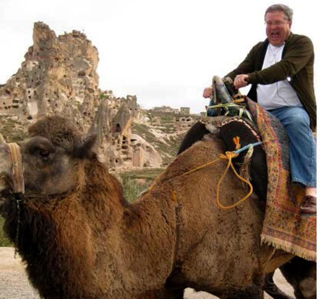 Don Balfour on camelback
