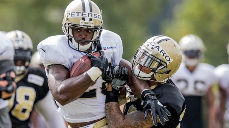 New Orleans Saints running back Adrian Peterson (28) and strong safety Kenny Vaccaro (32) participate in New Orleans Saints training camp on Aug. 2, 2017 at the Ochsner Sports Performance Center in Metairie, La. (Stephen Lew/Cal Sport Media/Zuma Press/TNS)